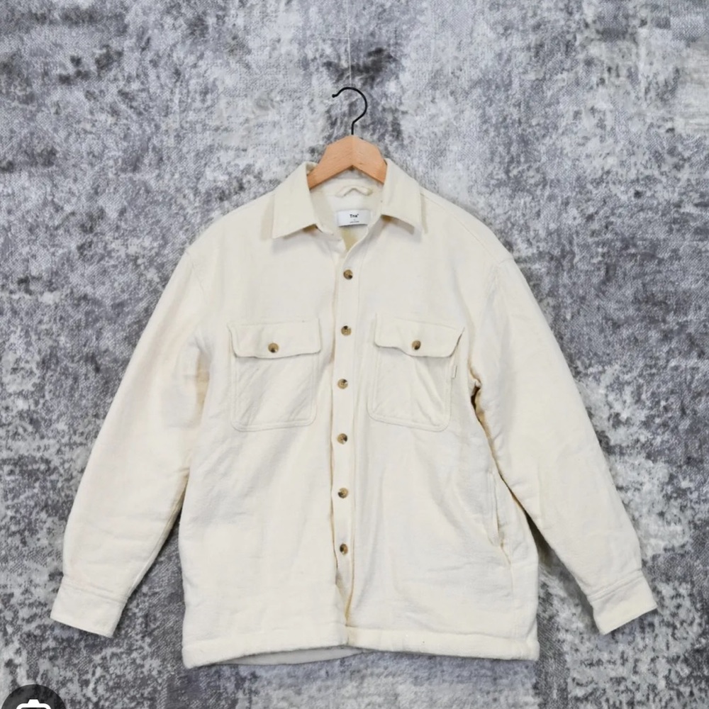 Size 2 TNA cream jacket coated in fur
